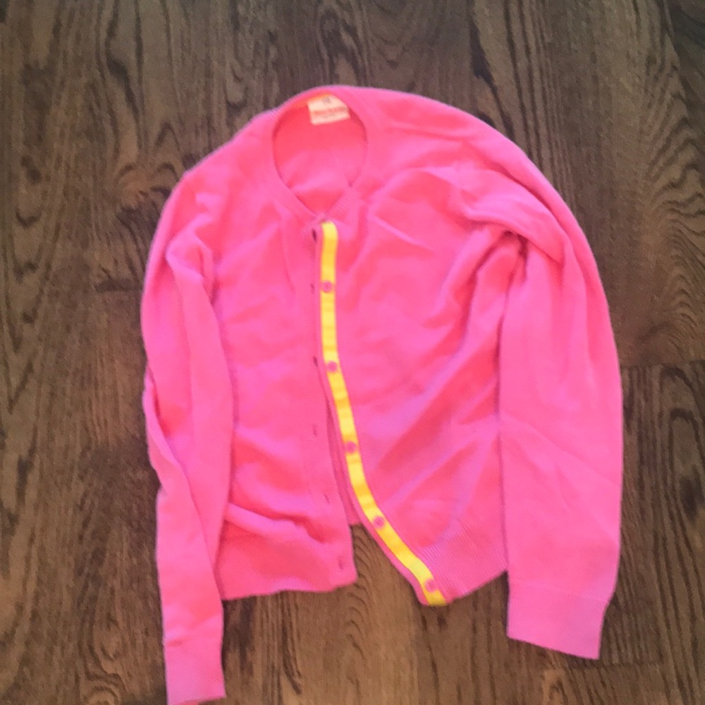 A pink sweater